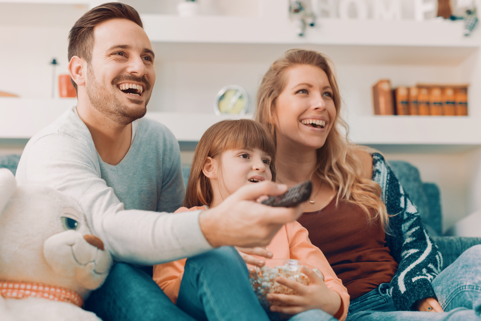 Young family watching TV